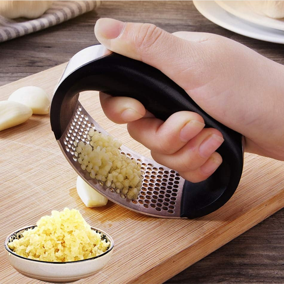 Prensador de ajo de acero inoxidable — Herramienta manual ergonómica