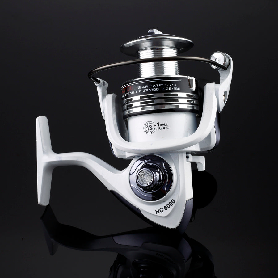 Carrete de pesca profesional de alta precisión – cuerpo metálico y manivela intercambiable