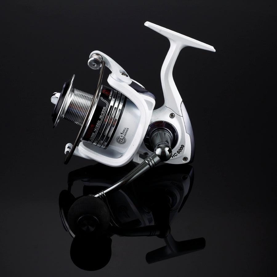 Carrete de pesca profesional de alta precisión – cuerpo metálico y manivela intercambiable