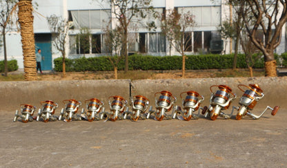 Carrete de pesca YUMOSHI 12BB ultraligero con mango de madera y cuerpo metálico