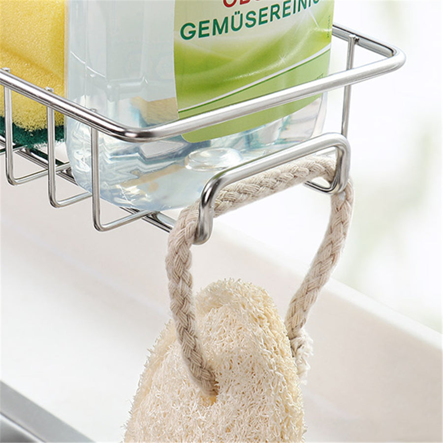 Organizador ajustable de fregadero en acero inoxidable y ABS para utensilios, esponjas y jabones.