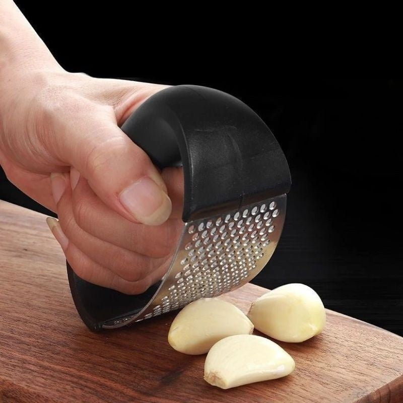 Prensador de ajo de acero inoxidable — Herramienta manual ergonómica