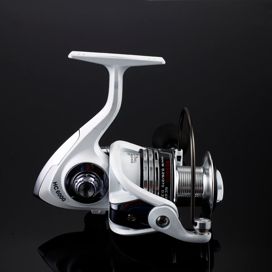 Carrete de pesca profesional de alta precisión – cuerpo metálico y manivela intercambiable