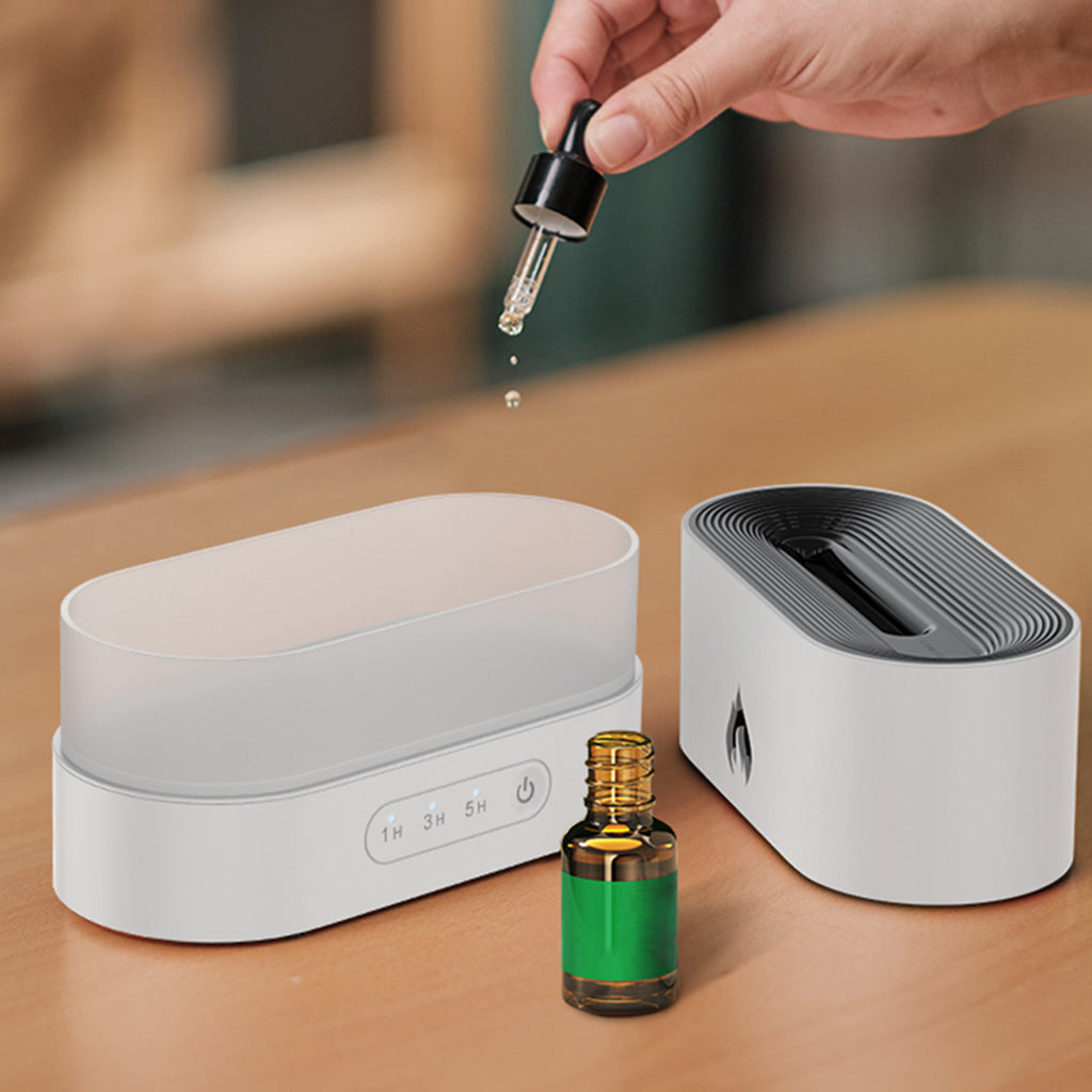 Difusor aromático con efecto llama y humidificación ultrasónica con luz ambiental LED.