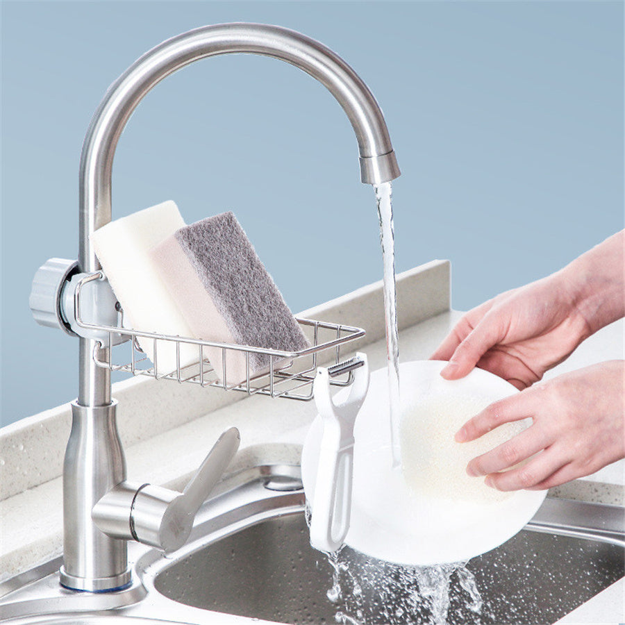 Organizador ajustable de fregadero en acero inoxidable y ABS para utensilios, esponjas y jabones.