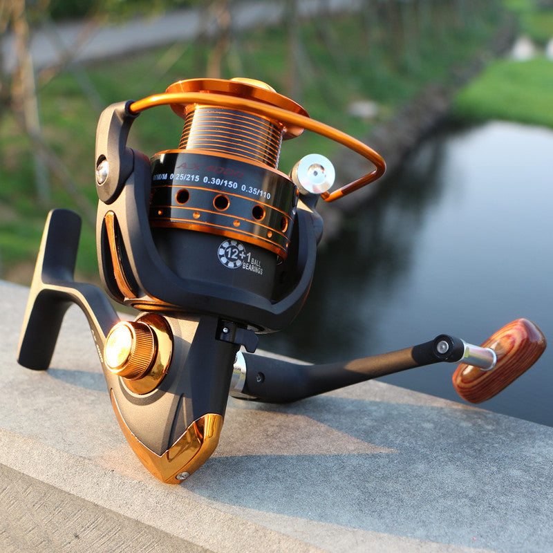 Carrete de pesca YUMOSHI 12BB ultraligero con mango de madera y cuerpo metálico