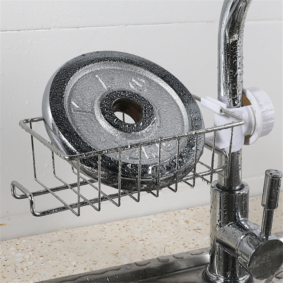 Organizador ajustable de fregadero en acero inoxidable y ABS para utensilios, esponjas y jabones.