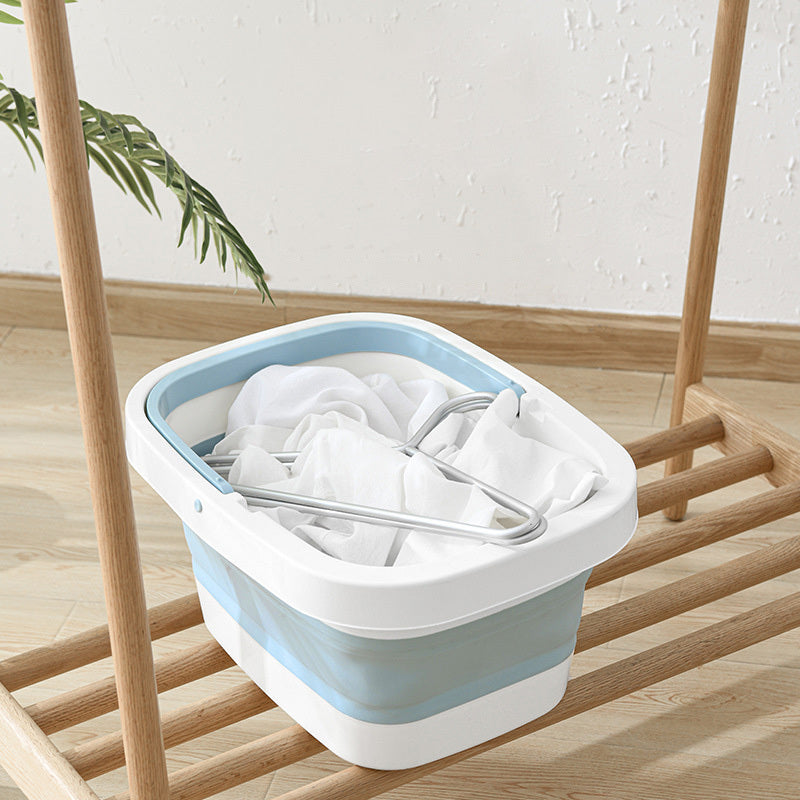 Cubo plegable para baño de pies en PP y TPE, diseño japonés resistente al calor de -20 °C a 100 °C, estructura ligera y portátil para relajación y cuidado personal.