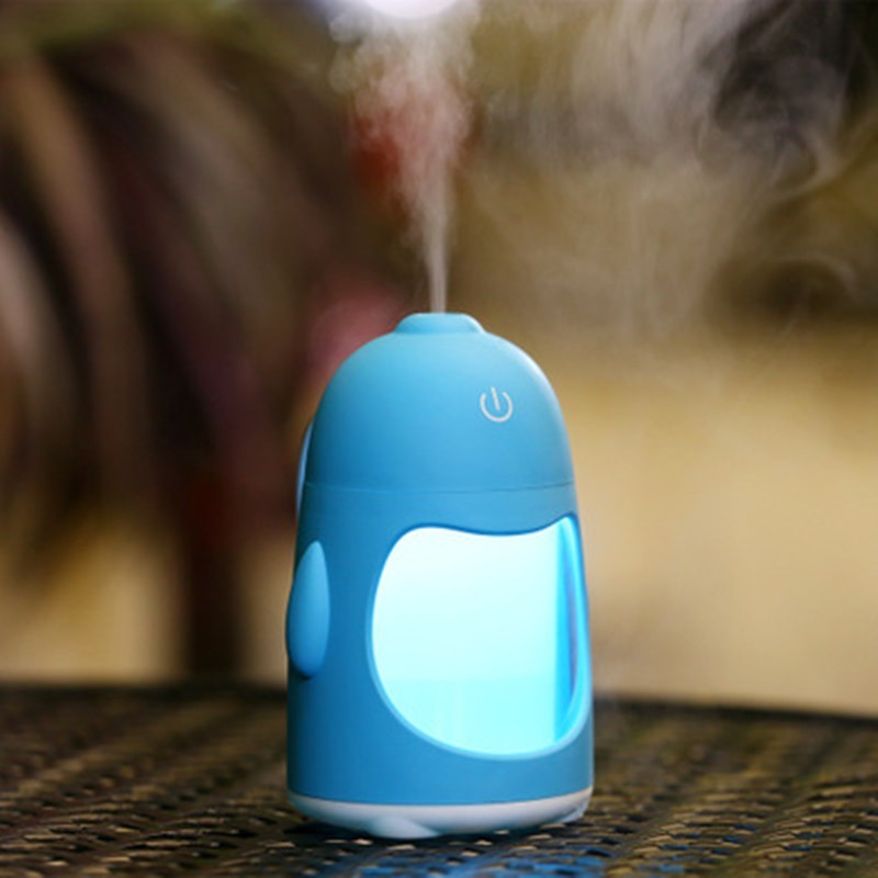 Humidificador ultrasónico de pingüino con depósito de 400 ml y luz LED para habitaciones pequeñas.