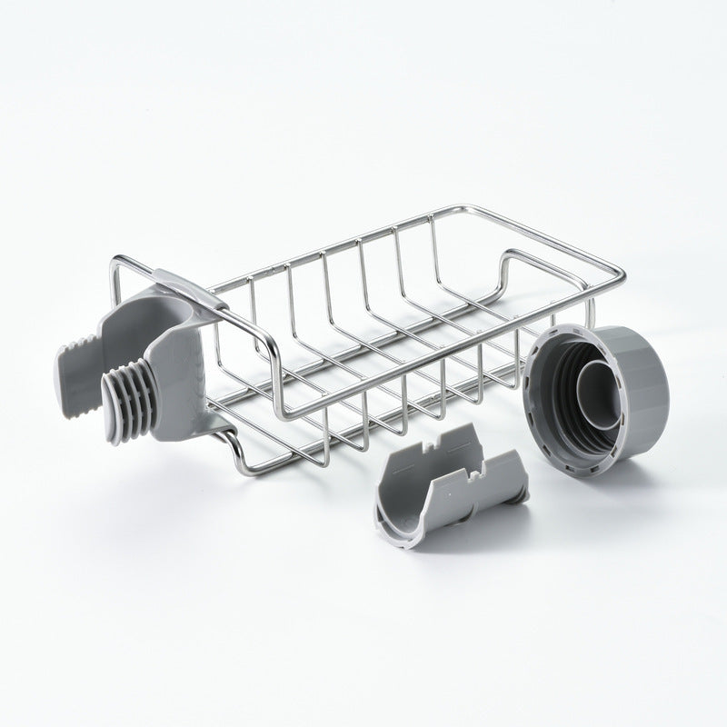 Organizador ajustable de fregadero en acero inoxidable y ABS para utensilios, esponjas y jabones.
