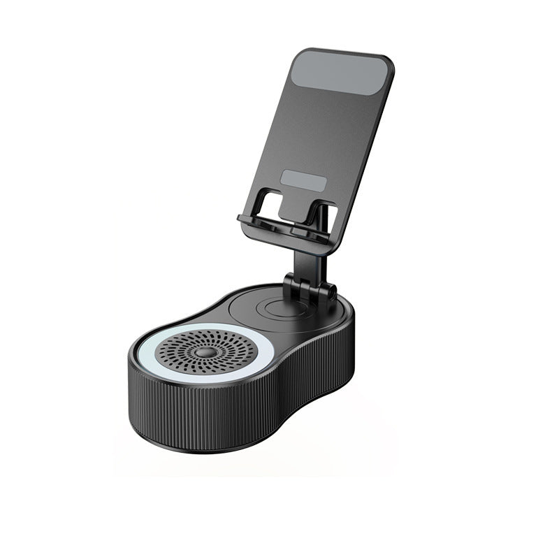 Soporte multifuncional blanco con altavoz Bluetooth, luz RGB, batería interna y base ajustable para teléfonos y tablets.
