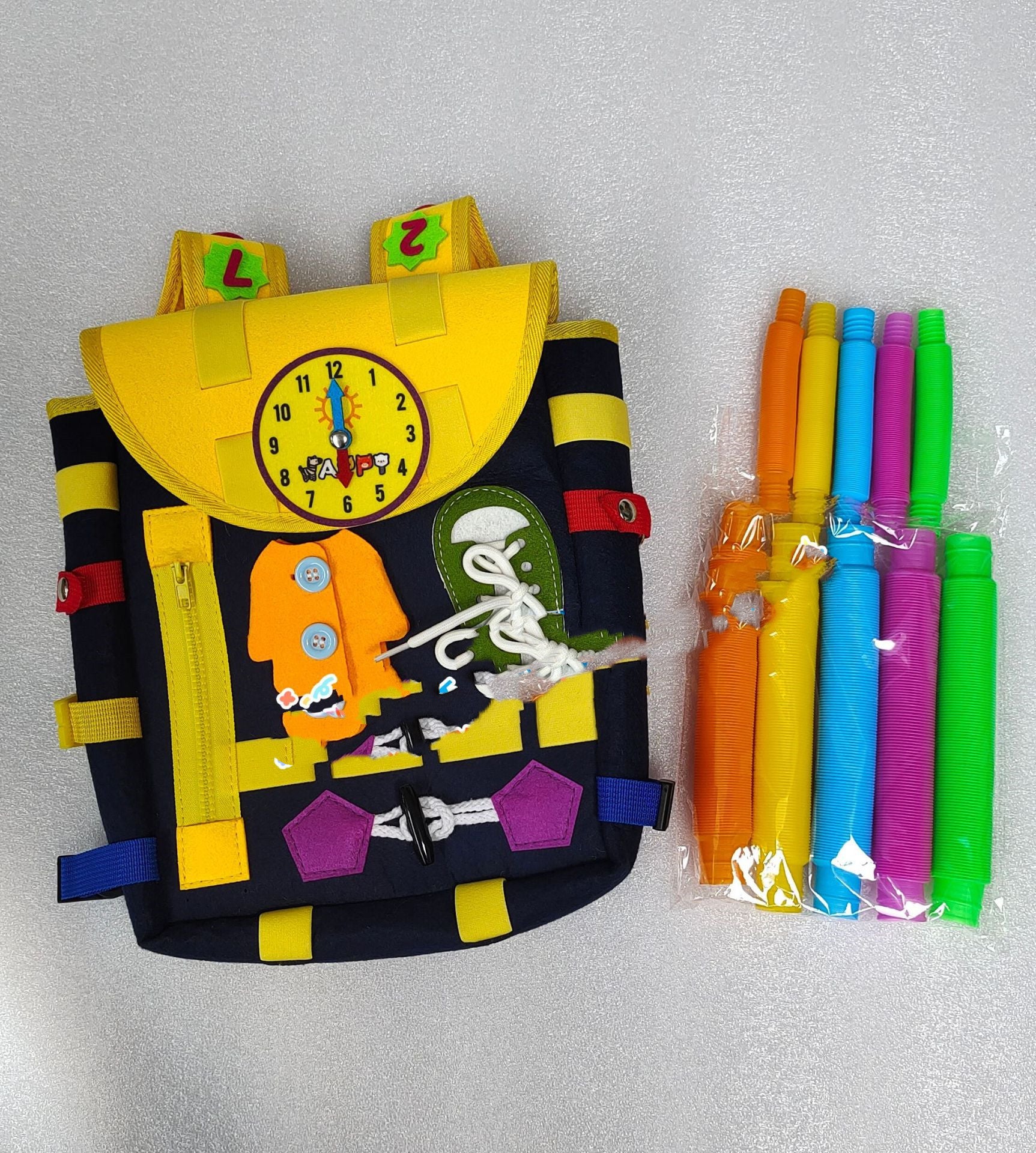 Mochila Busy Board Montessori para Niños – Juguete Educativo con Hebillas y Cremalleras