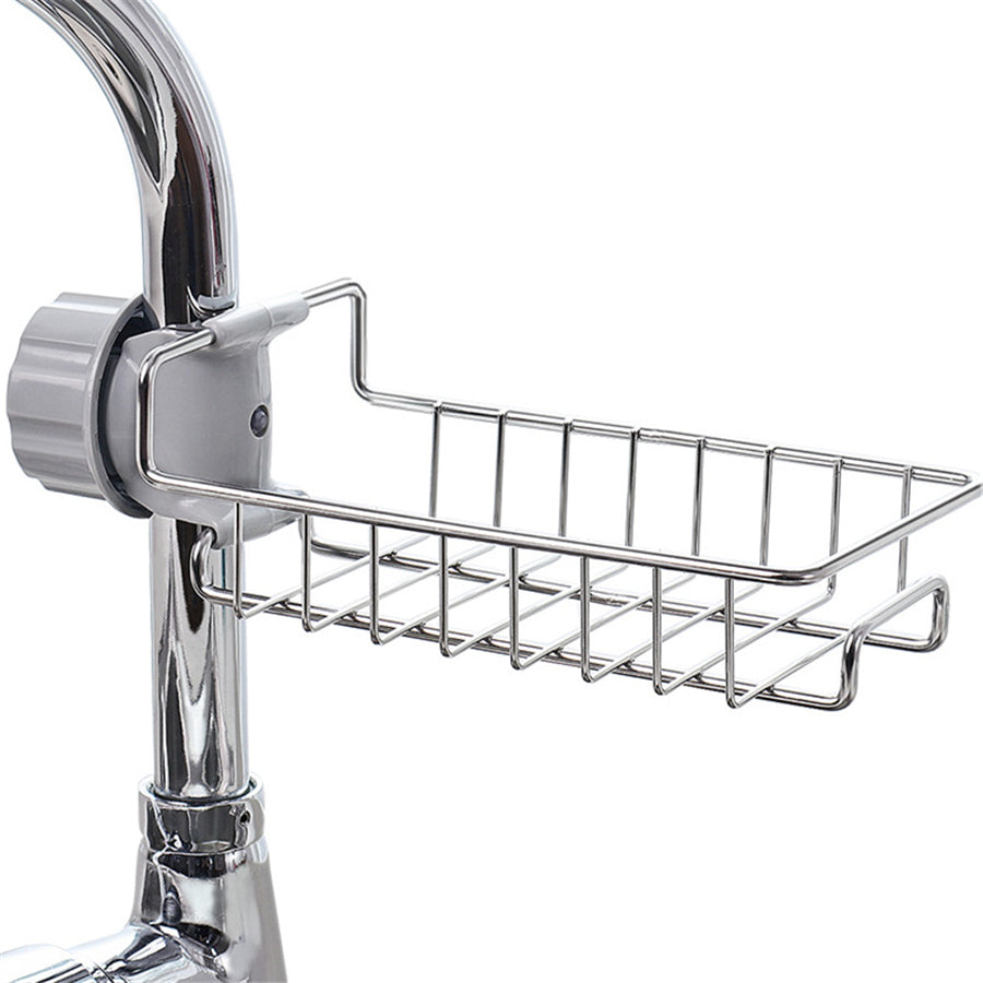 Organizador ajustable de fregadero en acero inoxidable y ABS para utensilios, esponjas y jabones.