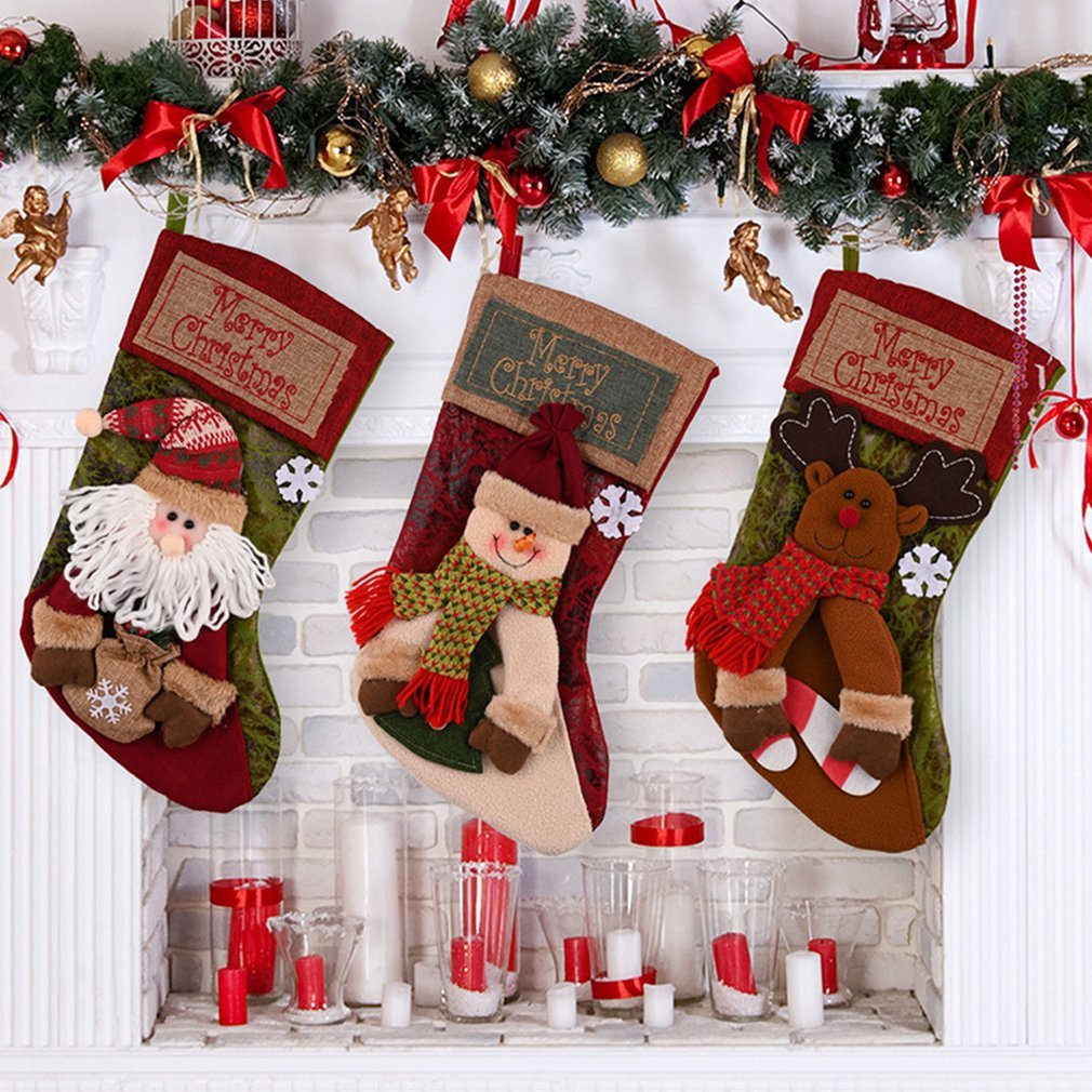 calcetín navideño decorativo 3D de arpillera y felpa con apliques artesanales y cinta para colgar multicolor