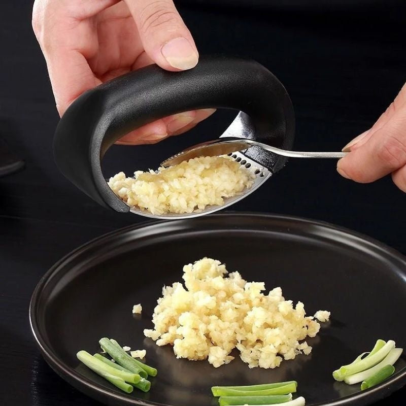 Prensador de ajo de acero inoxidable — Herramienta manual ergonómica