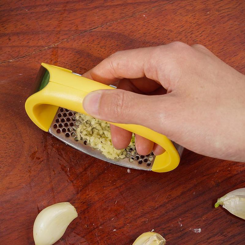 Prensador de ajo de acero inoxidable — Herramienta manual ergonómica