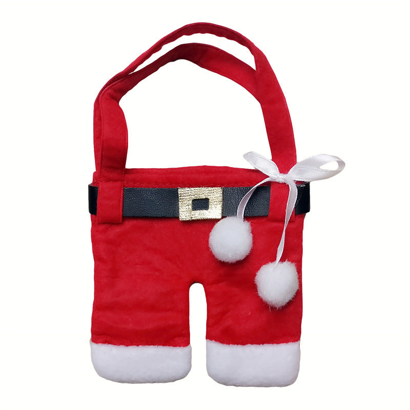 set navideño de cubiertos en tela no tejida con diseño de ropa de Papá Noel para decoración de mesa1