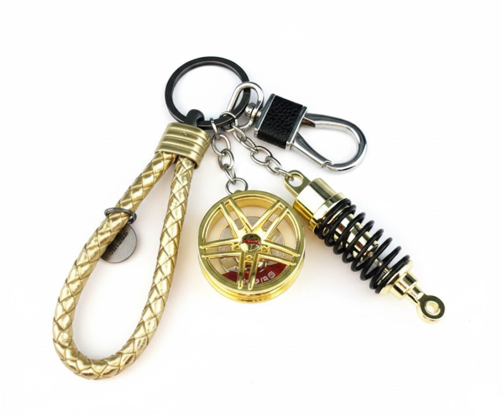 Llavero turbo deportivo con rueda y amortiguador – Accesorio metálico con cuerda trenzada y caja de regalo
